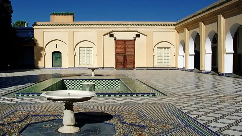 Dar Batha Palace in Fes, featuring traditional Andalusian-Moroccan architecture and lush gardens.