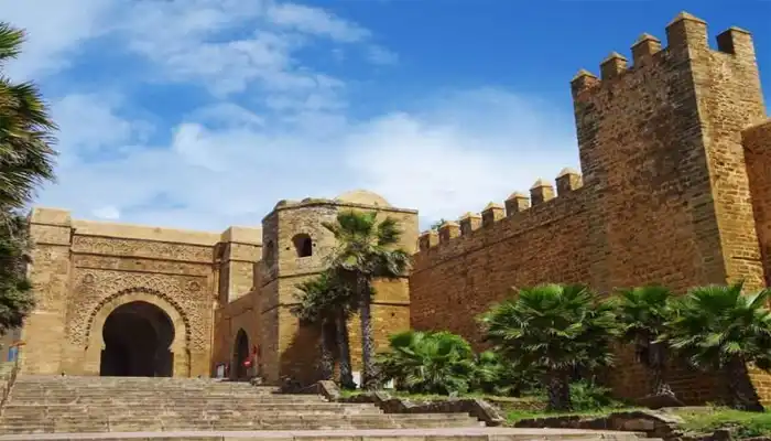 Kasbah of the Udayas in Rabat, Morocco, featuring traditional blue-and-white walls, narrow alleys, and views of the Bou Regreg river.