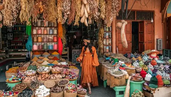 Colorful spices piled high in Marrakech spice souks, showcasing rich aromas and vibrant hues.