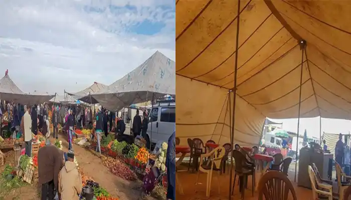 Souk El Khemis in Meknes, a bustling weekly market showcasing fresh produce, handcrafted goods, and household items, reflecting the dynamic local trade and culture.