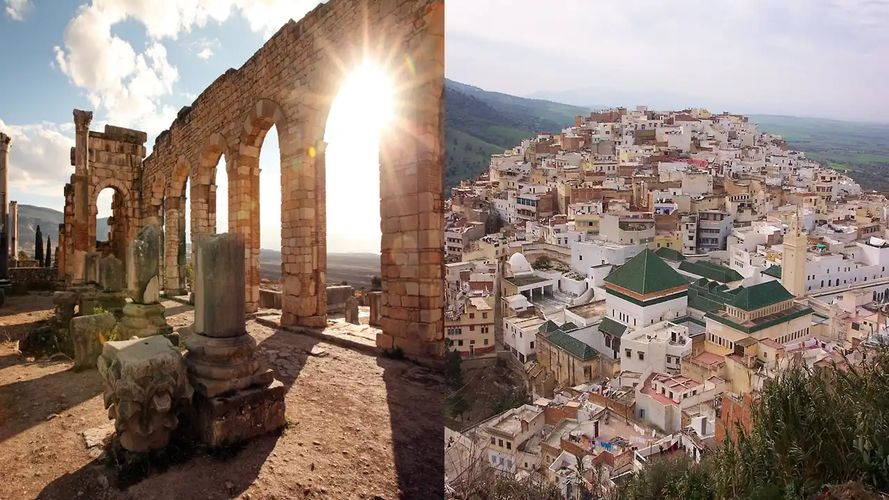 View of Volubilis Roman ruins and the hilltop town of Moulay Idriss nestled in Morocco's scenic Zerhoun Mountains.