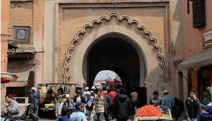 Bab Khemis in Meknes, a historic Moroccan gate adorned with exquisite geometric patterns and traditional stonework.