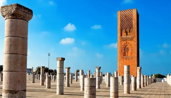 Hassan Tower in Rabat, Morocco, an iconic 12th-century minaret surrounded by historic columns and open courtyards.